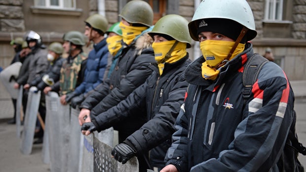 Anti-government protesters guard the streets next to the presidential offices Feb. 22, 2014, in Kiev, Ukraine. 