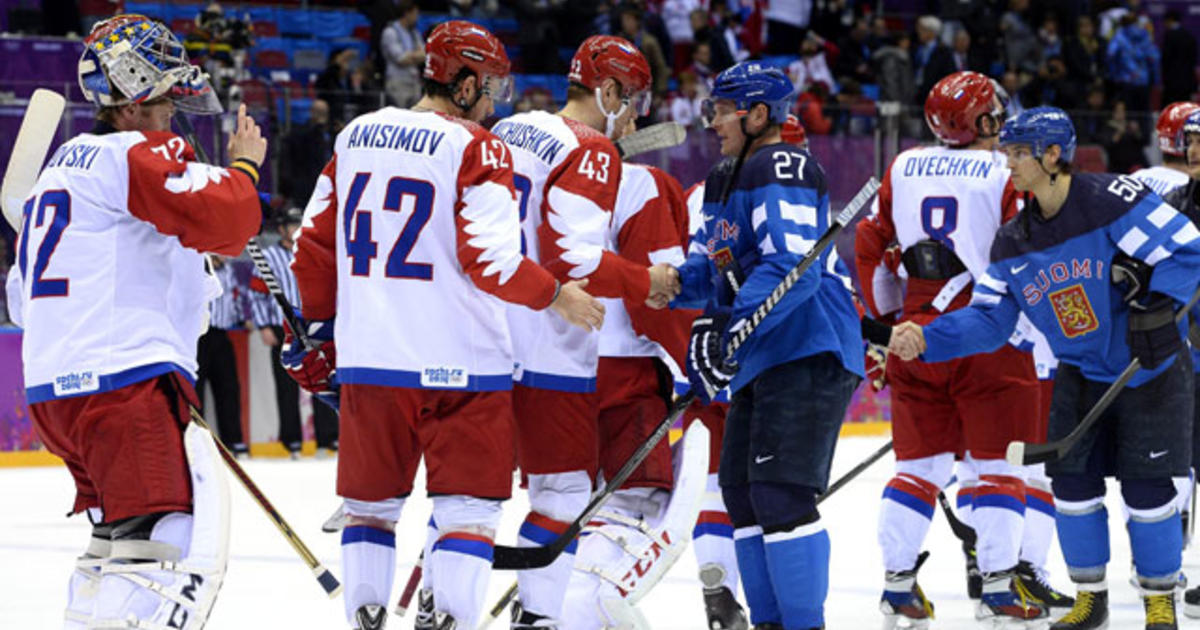 Russia's Alexander Ovechkin shakes hands with Canada's Sidney