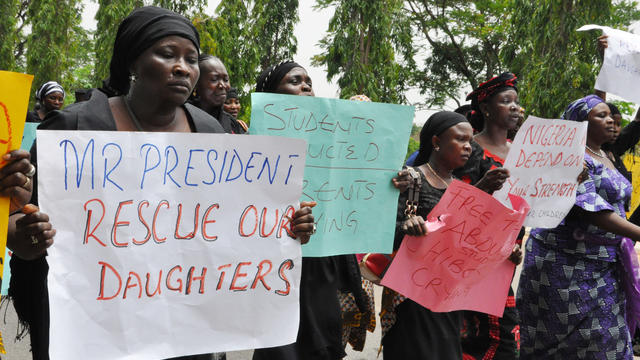 Mothers call for the president to help during a demonstration with others who have daughters among the kidnapped school girls of government secondary school Chibok 