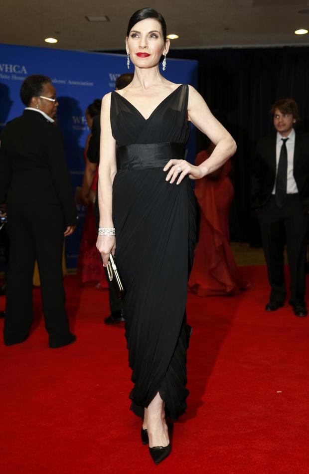 Actress Julianna Margulies arrives on the red carpet at the annual White House Correspondents' Association dinner in Washington May 3, 2014. 