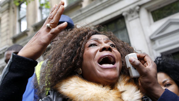A protester demonstrates against the kidnapping of school girls in Nigeria outside the Nigerian Embassy in London May 9, 2014. 