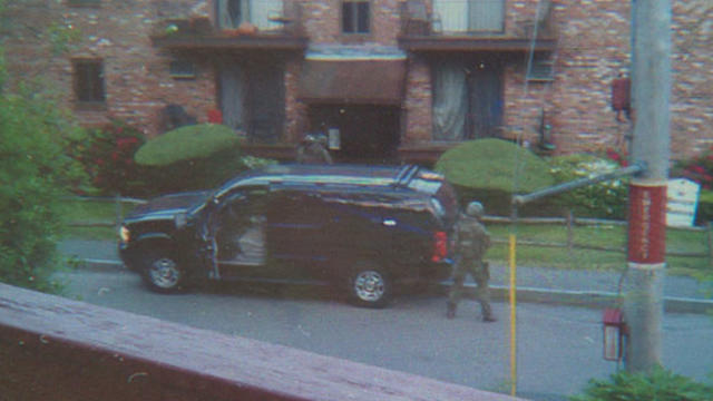 cops-outside-matanov-apartment.jpg 