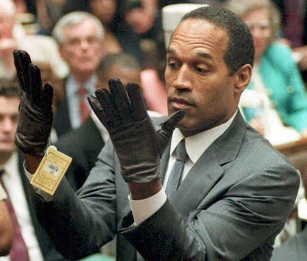 O.J. Simpson looks at a new pair of 