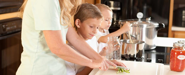 child kid parent cooking family chopping dinner 610 header 