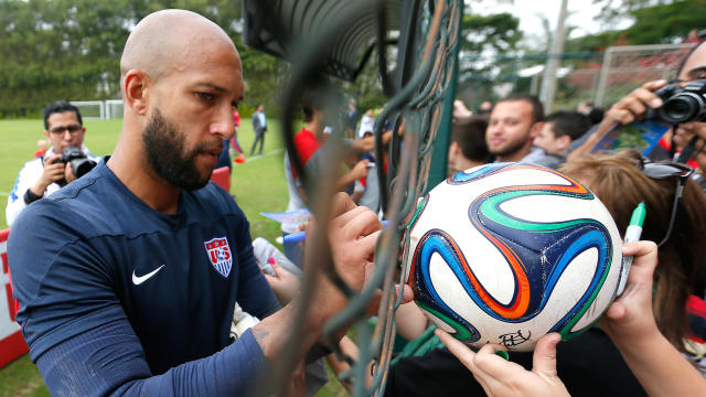Goalkeeper Tim Howard of the United States signs autographs after a team training session at Sao Paulo FC on June 11, 2014 in Sao Paulo, Brazil 