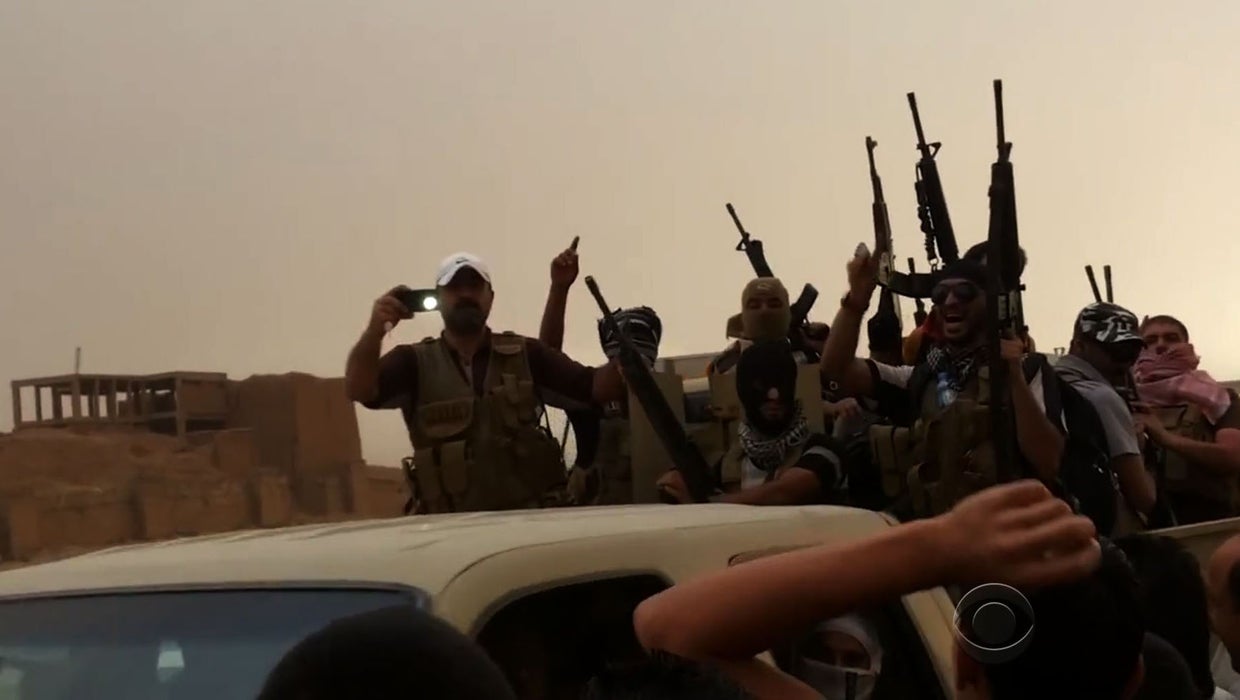 In captured Iraqi city of Mosul, residents welcome ISIS - CBS News