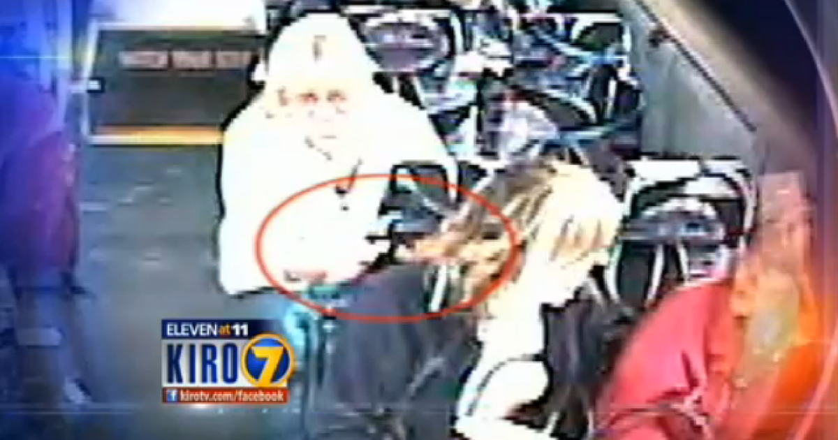 VIDEO Woman lights bus passenger's hair on fire CBS News