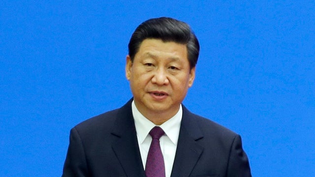 China's President Xi Jinping delivers a speech at a conference 