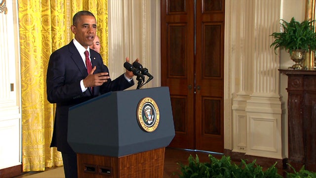 070414-obama-naturalization-cuts.jpg 