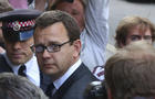 Former Editor of the News of the World Andy Coulson arrives for the sentencing at the Old Bailey court house in London 