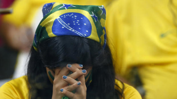 Faces of agony and ecstasy of German, Brazil fans 