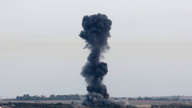 Smoke rises following an Israeli strike on the Gaza Strip July 12, 2014. 