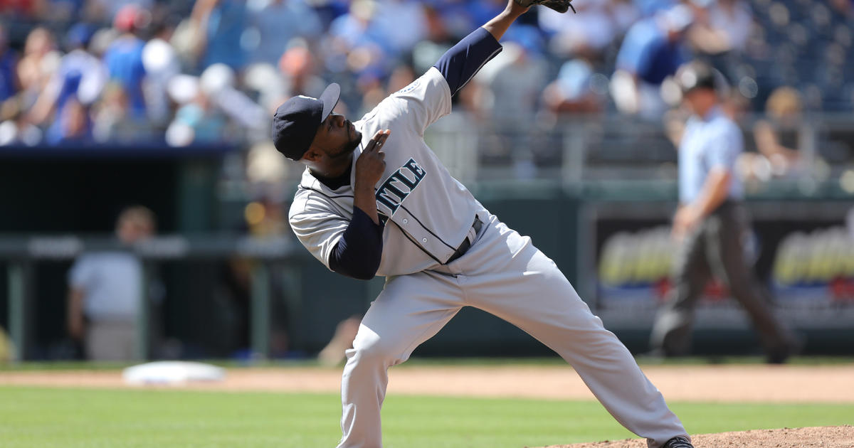 Giants' closing pitcher Sergio Romo lets out a scream as he make