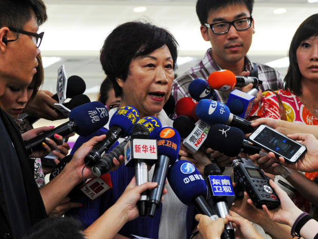 Jean Shen, director of Taiwan's Civil Aeronautics Administration, speaks to reporters at the Sungshan airport in Taipei July 23, 2014. 