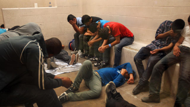 Immigrants who have been caught crossing the border illegally are housed inside the McAllen Border Patrol Station in McAllen, Texas, where they are processed. 