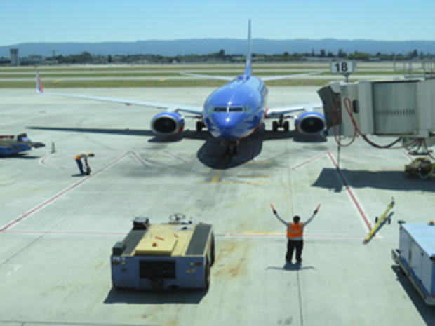 Airplane Arrival (Credit, Randy Yagi) 