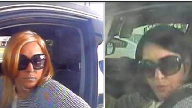 Surveillance picture of woman in disguise at ATM 
