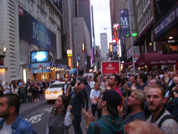 crowd gathers to see dimming of lights in honor of Joan Rivers 