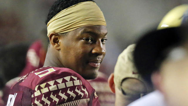 Florida State quarterback Jameis Winston stands on the sideline during the fourth quarter of an NCAA college football game in Tallahassee, Fla., Sept. 6, 2014. 