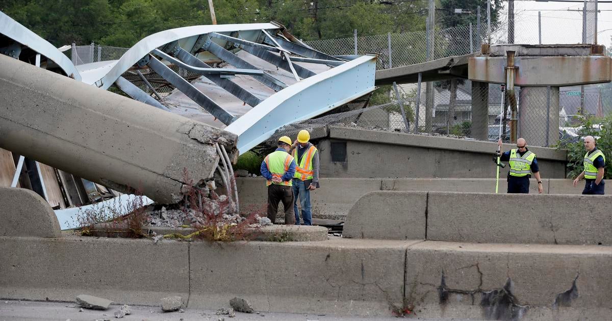 Police: Truck driver dies after Detroit pedestrian bridge collapse ...