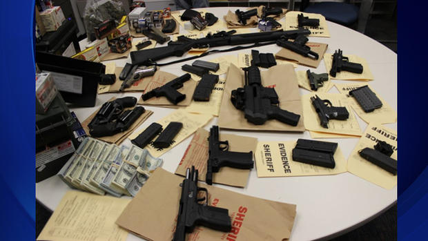 guns and money from search warrant 