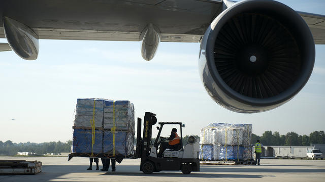 Supplies to aid in the fight against Ebola in Liberia are loaded onto a 747 aircraft at Charlotte-Douglas International Airport in Charlotte, North Carolina, Oct. 1, 2014. 