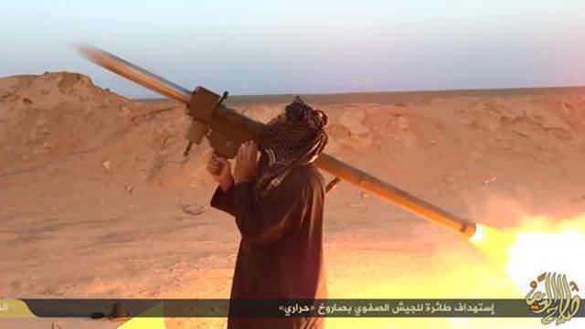 ​An image from a video released by ISIS purports to show one of the group's militants firing a MANPAD rocket at an Iraqi aircraft in the city of Baiji 