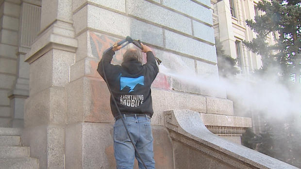 Cleaning graffiti from state capitol 