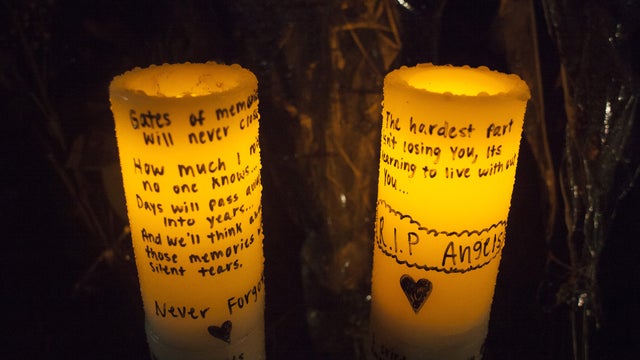 Candles are pictured at a memorial at Marysville-Pilchuck High School Oct. 31, 2014, in Marysville, Washington. 