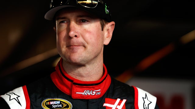 NASCAR driver Kurt Busch stands in the garage area during practice for the NASCAR Sprint Cup Series Goody's Headache Relief Shot 500 at Martinsville Speedway Oct. 25, 2014, in Martinsville, Virginia. 