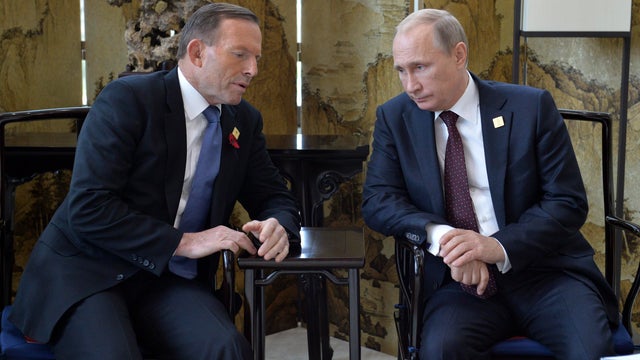 Russia's President Vladimir Putin (R) meets with Australia's Prime Minister Tony Abbott 