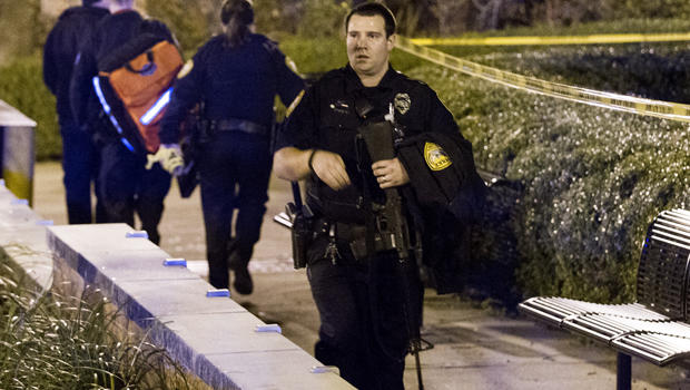Tallahassee police investigate a shooting outside the Strozier library on the Florida State University campus in Tallahassee, Fla., Nov 20, 2014. 