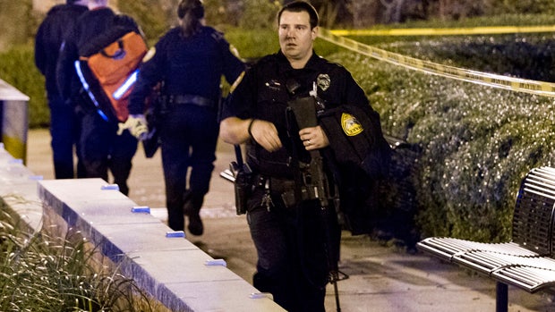 Tallahassee police investigate a shooting outside the Strozier library on the Florida State University campus in Tallahassee, Fla., Nov 20, 2014. 
