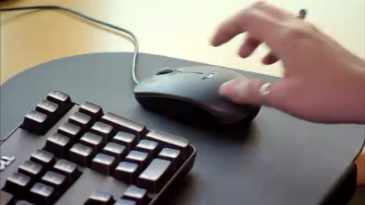 online shopping hand on mouse 