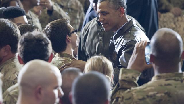 President Obama greets U.S. troops during a surprise visit to Bagram Air Field, north of Kabul, in Afghanistan, May 25, 2014, prior to the Memorial Day holiday. 