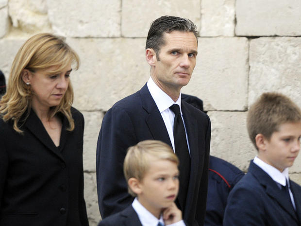File photo shows Spain's Princess Cristina and her husband, former Olympic handball player Inaki Urdangarin and their family at funeral of his father in May 2012 