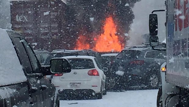 A fire is seen following a multiple vehicle pileup on Interstate 93 near Ashland, New Hampshire, Jan. 2, 2015. 