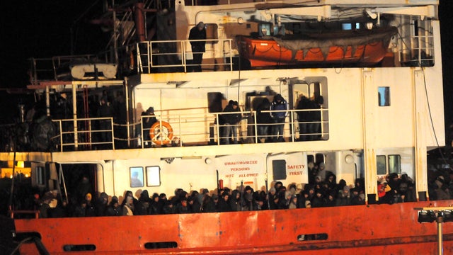 The Blue Sky M cargo ship, carrying an estimated 900 migrants, is seen at the Gallipoli harbour, southern Italy 
