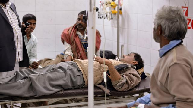 An alcohol poisoning patient receives treatment at the King George Medical College Hospital in Lucknow on Jan. 12, 2015.  