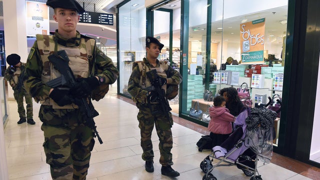 French soldiers patrol in a shopping center in Lyon, France 