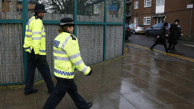 Police officers patrol in a Jewish neighborhood in north London 