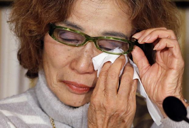 Junko Ishido, mother of Kenji Goto, a Japanese journalist being held captive by ISIS militants along with another Japanese citizen, reacts during a news conference at the Foreign Correspondents' Club of Japan in Tokyo January 23, 2015 