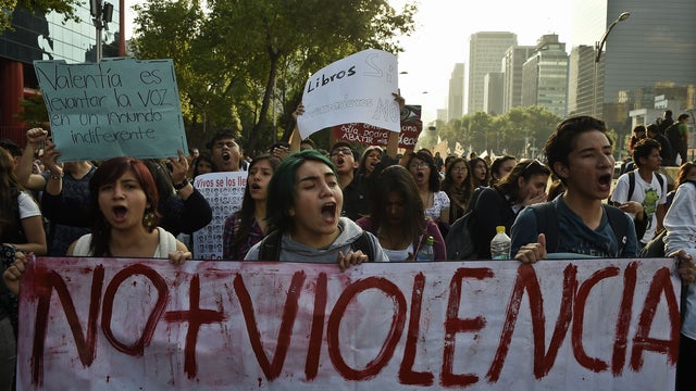Students take part in one of several marches commemorating four months of the disappearance of 43 students from Ayotzinapa, on Jan. 26, 2015, in Mexico City. 