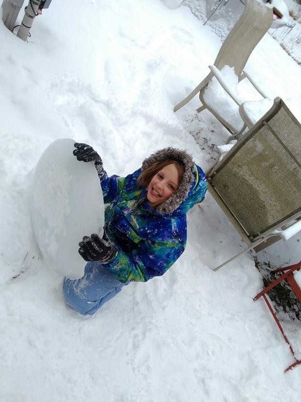 barely-3-inches-but-gracie-making-the-most-of-it-with-her-homemade-ice-sled-mary-paruolo.jpg 