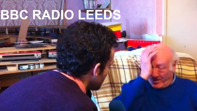 ​Stan Beaton, right, reacts upon hearing the voicemail greeting recorded by his late wife 