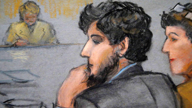 A courtroom sketch shows Boston Marathon bombing suspect Dzhokhar Tsarnaev, center, during the jury selection process in his trial at the federal courthouse in Boston, Massachusetts, Jan. 15, 2015. 