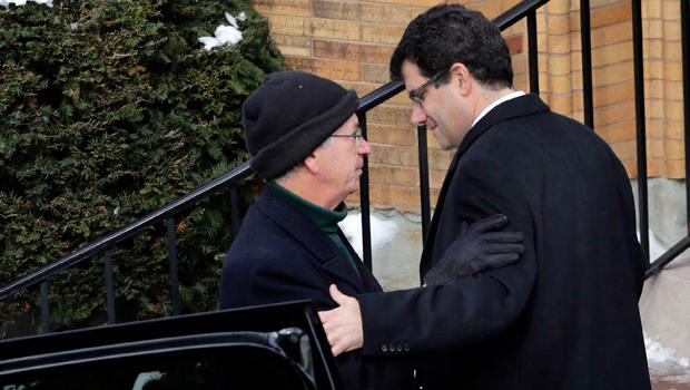 Alan Brody, right, arrives for the funeral of his wife, Ellen Brody, at Chabad of the Rivertowns, in Dobbs Ferry, N.Y, Feb. 6, 2015. 