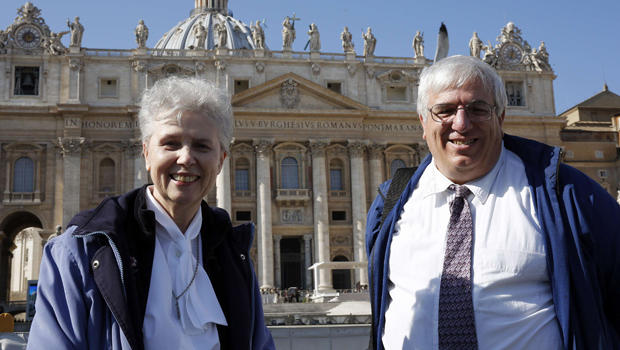 Sister Jeannine Gramick and Francis DeBernardo of New Ways Ministry, which ministers to homosexual Catholics and promotes gay rights, pose in front of St. Peter's Basilica after Pope Francis' weekly audience Feb. 18, 2015. 