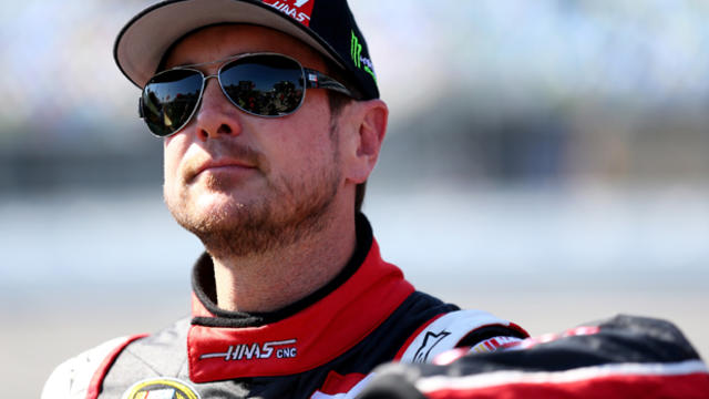 Kurt Busch, then driver of the #41 Haas Automation Chevrolet, stands on the grid during qualifying for the 57th Annual Daytona 500 at Daytona International Speedway Feb. 15, 2015, in Daytona Beach, Florida. 