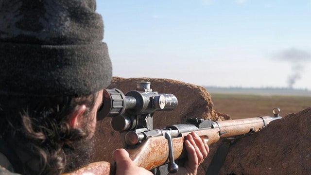 ISIS militant during clashes near the village of Tel Tamr, in Syria's northeast Hassakeh province 